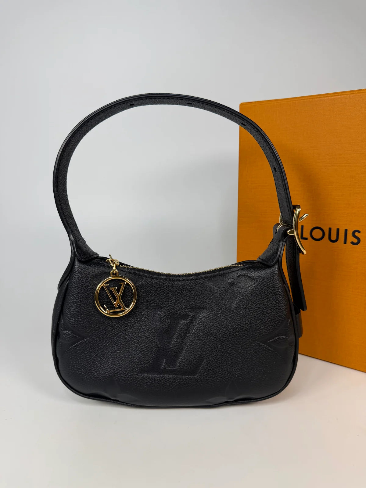 LOUIS VUITTON MINI MOON BAG IN BLACK LEATHER WITH GOLD HARDWARE