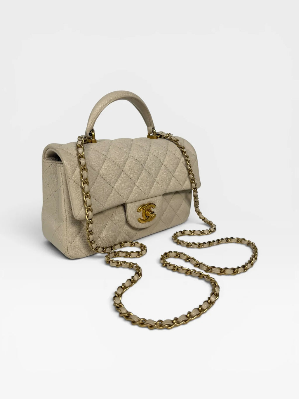 CHANEL MINI RECTANGLE TOP HANDLE IN CREAM CAVIAR LEATHER WITH AGED GOLD HARDWARE