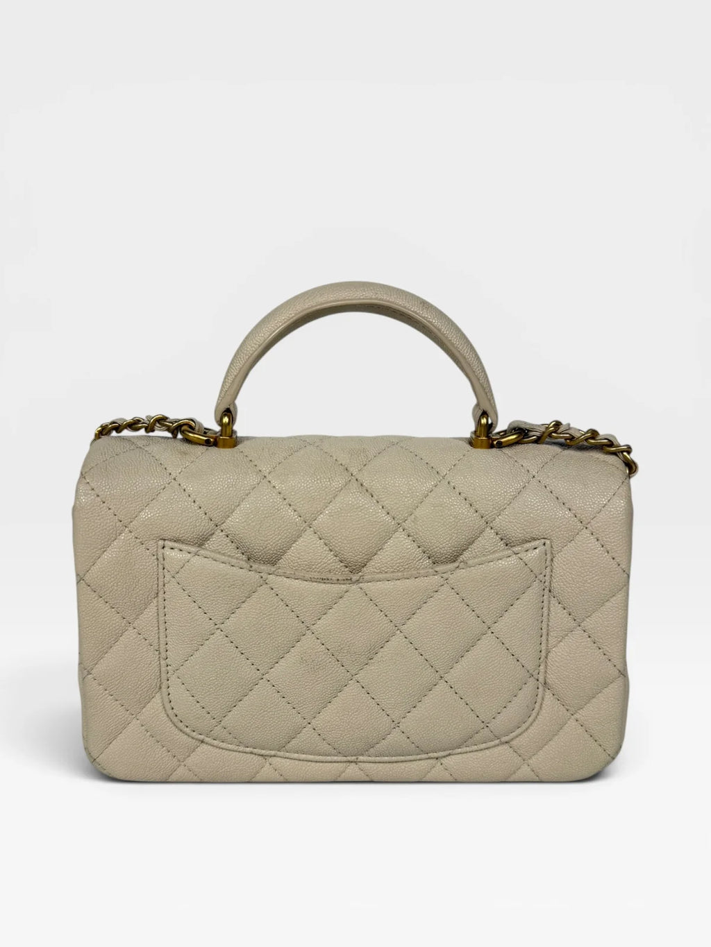 CHANEL MINI RECTANGLE TOP HANDLE IN CREAM CAVIAR LEATHER WITH AGED GOLD HARDWARE