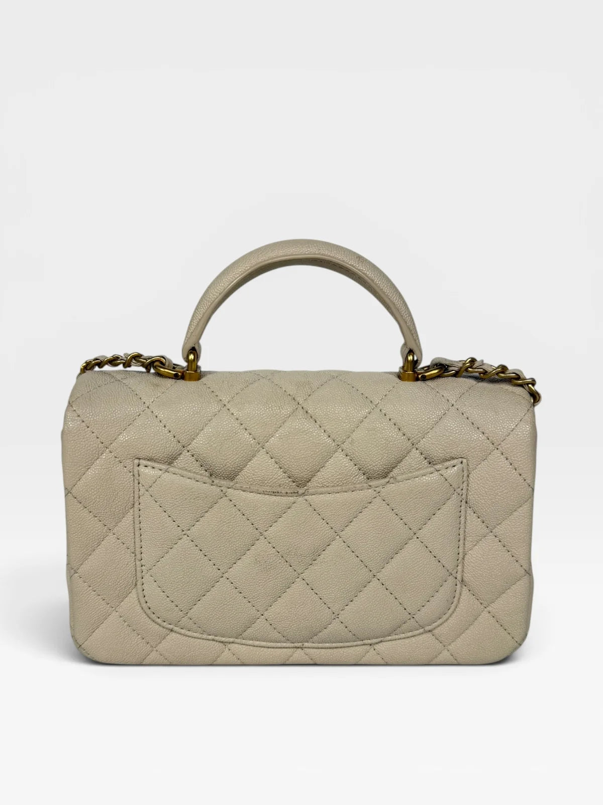 CHANEL MINI RECTANGLE TOP HANDLE IN CREAM CAVIAR LEATHER WITH AGED GOLD HARDWARE
