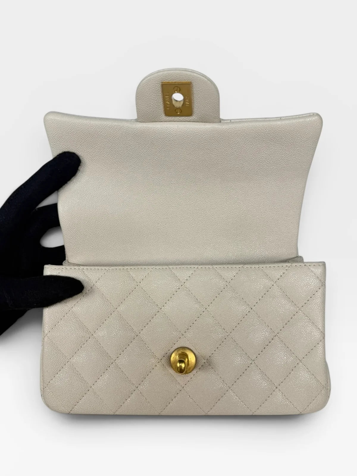 CHANEL MINI RECTANGLE TOP HANDLE IN CREAM CAVIAR LEATHER WITH AGED GOLD HARDWARE