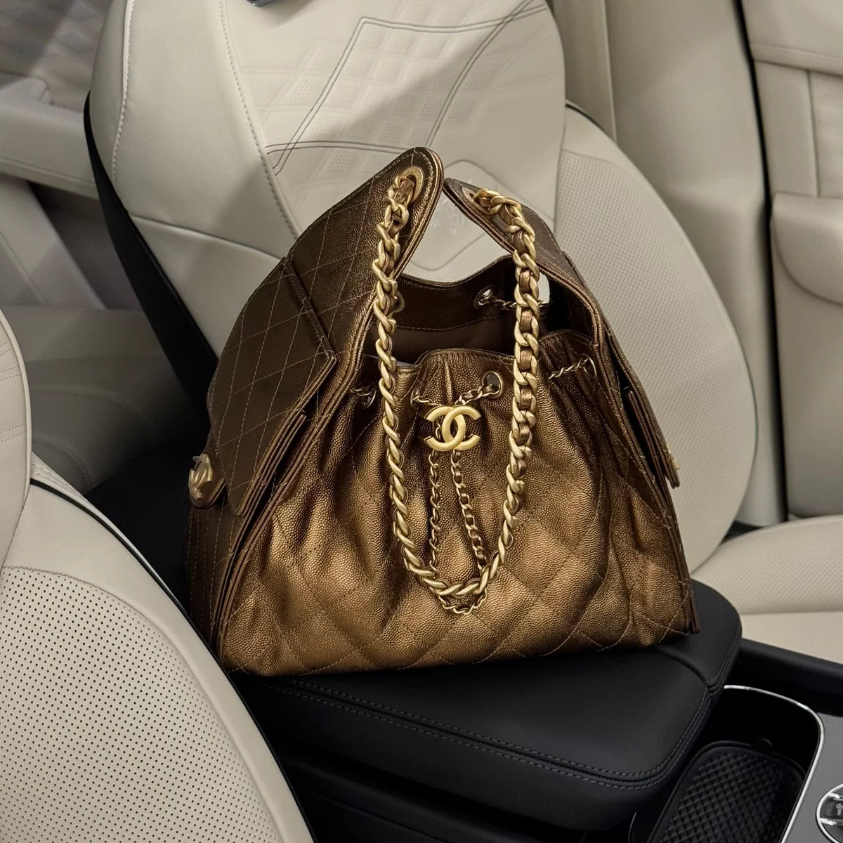 CHANEL 25 SMALL IN METALLIC BRONZE CAVIAR LEATHER WITH GHW